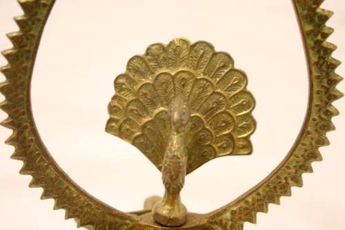 An awesome Indian made solid brass Diya oil lamp with a peacock motif in the centre Lifespace Sale