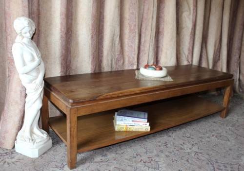 A stunning stylish solid Teak TV stand/ coffee table with neat clean lines.