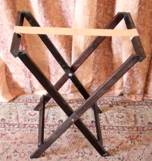 A lovely wooden butlers tray w/ removable tray, perfect for extra serving space around the house.