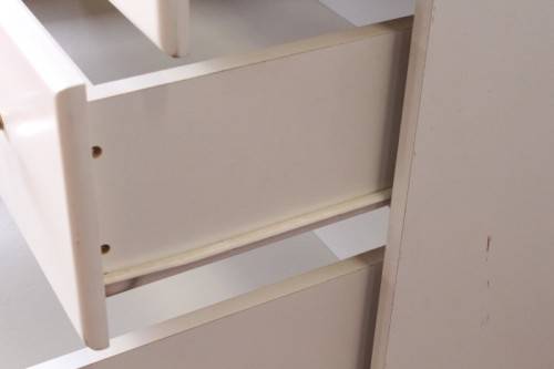 A stunning white 5-drawer chest of drawers with crystal/ glass? handles and ample storage space