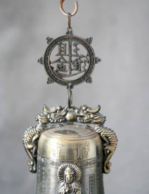 An amazing vintage Chinese bell on a wood stand with lovely detailing.