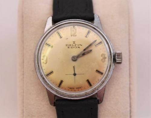 An awesome vintage Swiss made Delfin Edox ladies stainless steel watch with a black leather strap