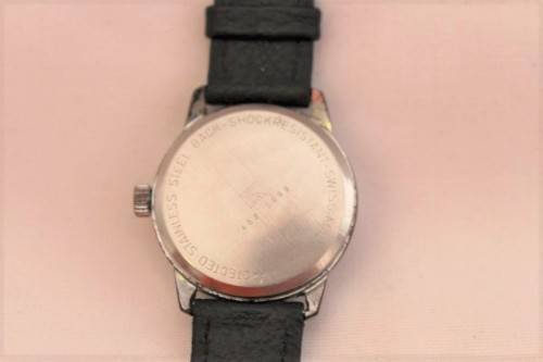 An awesome vintage Swiss made Delfin Edox ladies stainless steel watch with a black leather strap