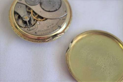 An exquisite antique (c1932) 14ct gold filled ornate Elgin pocket watch with an inscription