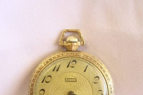 An exquisite antique (c1932) 14ct gold filled ornate Elgin pocket watch with an inscription
