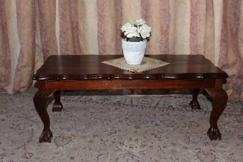 A lovely vintage scalloped edge solid Imbuia wood ball and claw coffee/ side table