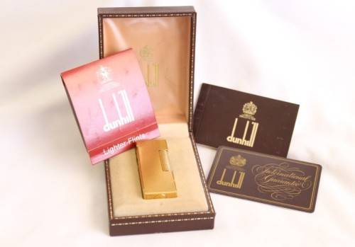 A beautiful vintage (c1972) gold plated Dunhill Rollagas lighter in its box in working condition