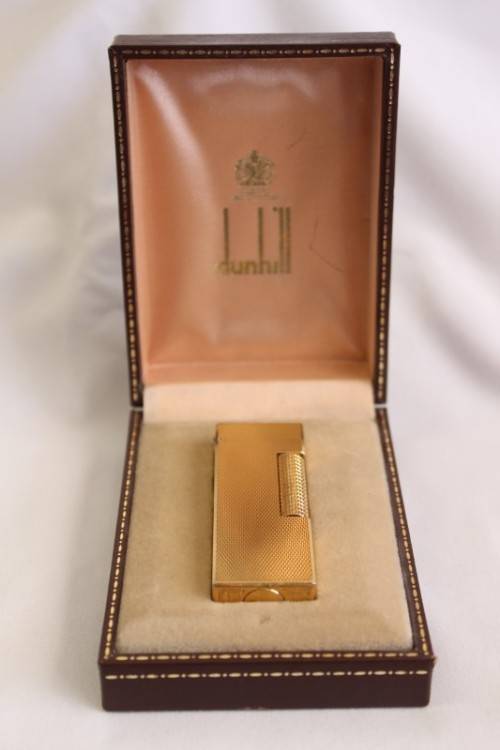 A beautiful vintage (c1972) gold plated Dunhill Rollagas lighter in its box in working condition