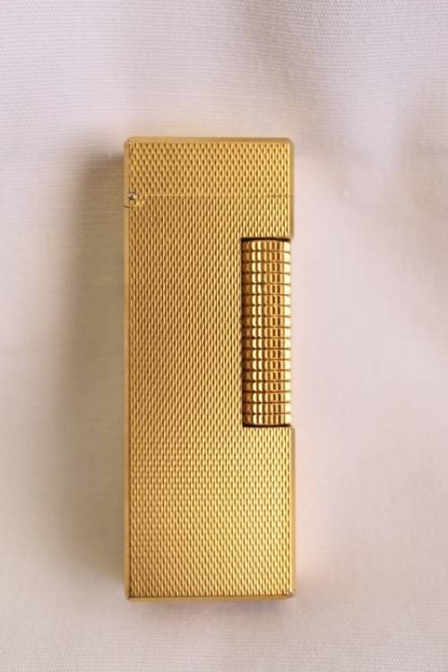 A beautiful vintage (c1972) gold plated Dunhill Rollagas lighter in its box in working condition