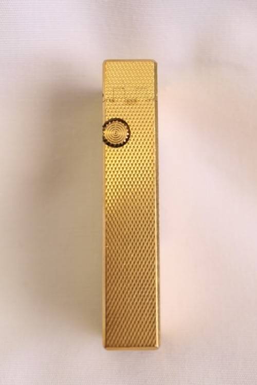 A beautiful vintage (c1972) gold plated Dunhill Rollagas lighter in its box in working condition