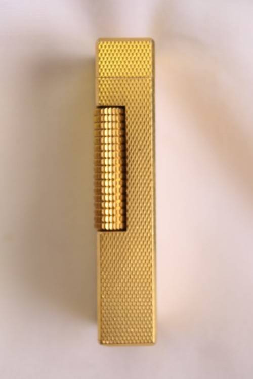 A beautiful vintage (c1972) gold plated Dunhill Rollagas lighter in its box in working condition