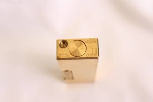 A beautiful vintage (c1972) gold plated Dunhill Rollagas lighter in its box in working condition