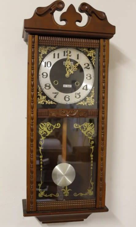 A beautiful, stylish vintage wall hanging "Blessings" 31 day wind up pendulum clock.