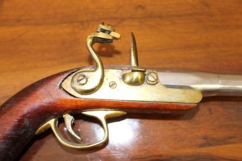 A fantastic wood with brass & metal embellishments vintage powder pistol. Awesome display piece!!!
