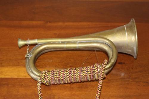 A fabulous vintage brass military bugle with colourful rope & tassel.  Lifespace Sale