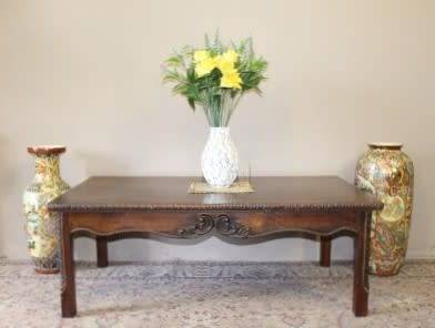 A large beautiful centre coffee table with stunning carved legs and sides. Lifespace Sale
