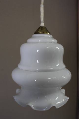 A beautiful white glass single pendant ceiling light, perfect in formal rooms.