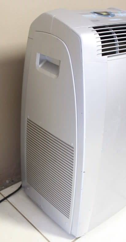 A fantastic De Longhi Pinguino PAC C110 portable air conditioner in full working order.