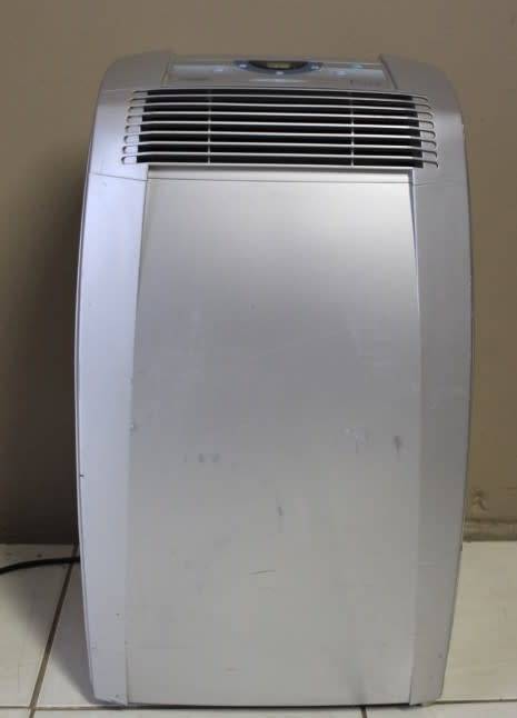 A fantastic De Longhi Pinguino PAC C110 portable air conditioner in full working order.