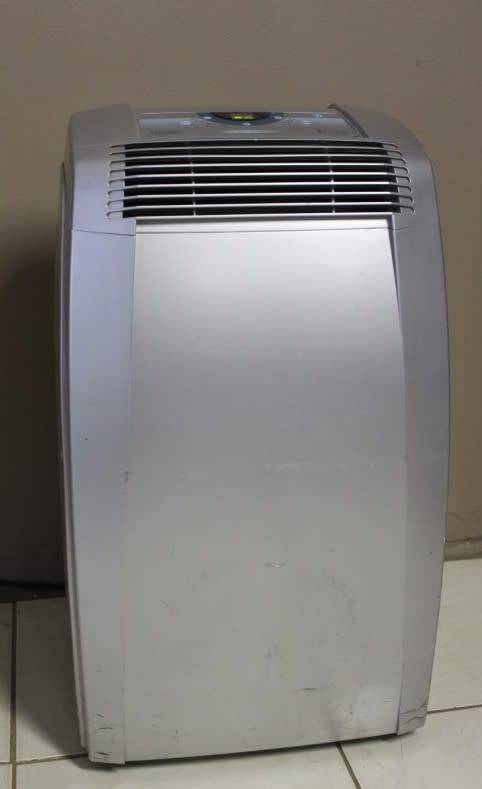 A stylish De Longhi Pinguino PAC C110 portable air conditioner in full working order.