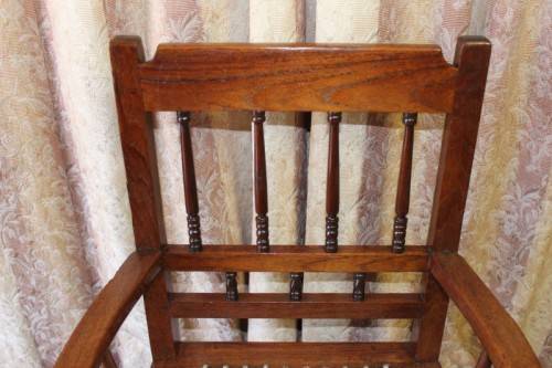 A beautifully made solid Kiaat wood armchair/ carver chair w/ a riempie seat.