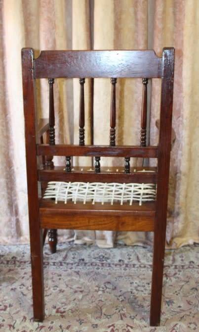 A beautifully made solid Kiaat wood armchair/ carver chair w/ a riempie seat.
