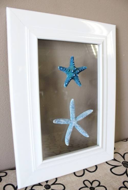 An awesome real "Starfish" on a glass panel in a white frame. Stunning in all homes!!