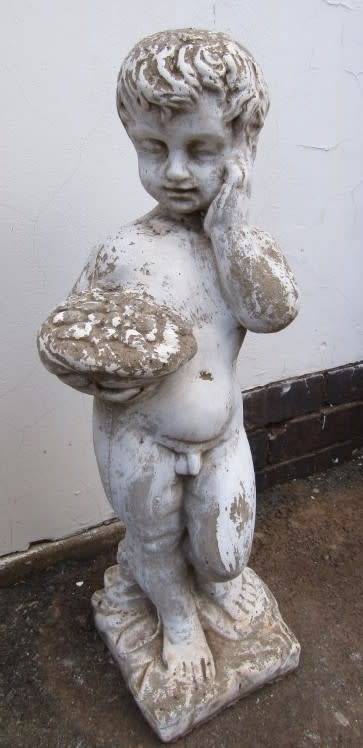 A gorgeous concrete statue of a little boy holding a bowl. Stunning in a garden! Linespace Sale