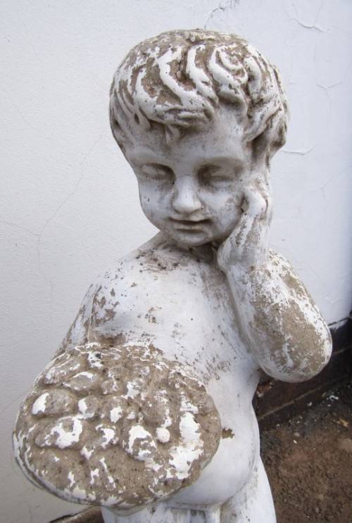 A gorgeous concrete statue of a little boy holding a bowl. Stunning in a garden! Linespace Sale