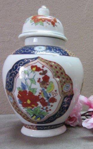 A beautiful, colorful Chinese lidded Ginger jar . Gorgeous on display!!