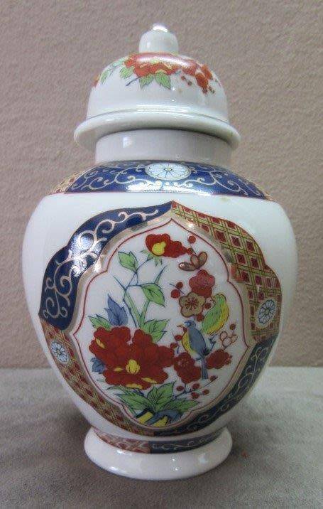 A beautiful, colorful Chinese lidded Ginger jar . Gorgeous on display!!