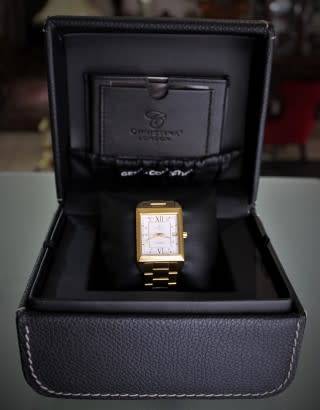 A good-looking original Christina London gold plated Swiss made diamond wrist watch.