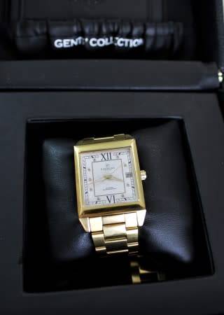 A good-looking original Christina London gold plated Swiss made diamond wrist watch.