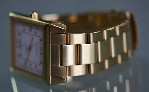 A good-looking original Christina London gold plated Swiss made diamond wrist watch.