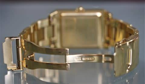 A good-looking original Christina London gold plated Swiss made diamond wrist watch.