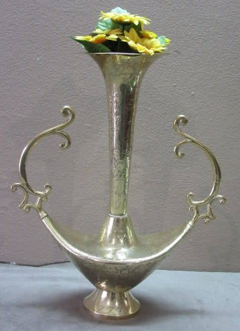 A lovely solid brass vase with two handles. Beautiful on display! Lifespace Sale
