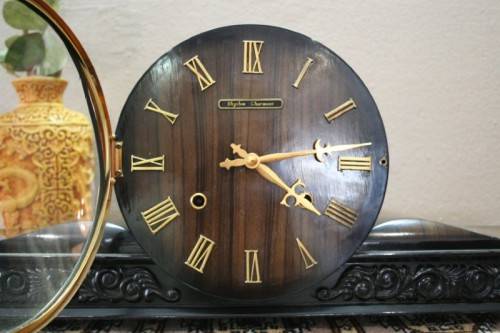 A beautiful Rhythm Charmant mantel clock, chimes on the hour,1/2 hour. Lifespace Sale