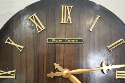 A beautiful Rhythm Charmant mantel clock, chimes on the hour,1/2 hour. Lifespace Sale