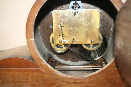 A beautiful Rhythm Charmant mantel clock, chimes on the hour,1/2 hour. Lifespace Sale