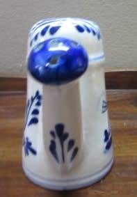 A wonderful small vintage porcelain watering can, great on display. Lifespace Sale