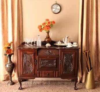 A gorgeous, large vintage Imbuia wood ball & claw buffet/ side server, with carved doors!