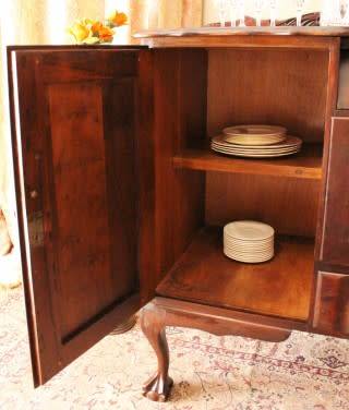 A gorgeous, large vintage Imbuia wood ball & claw buffet/ side server, with carved doors!