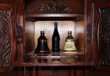 A gorgeous, large vintage Imbuia wood ball & claw buffet/ side server, with carved doors!