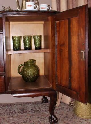 A gorgeous, large vintage Imbuia wood ball & claw buffet/ side server, with carved doors!
