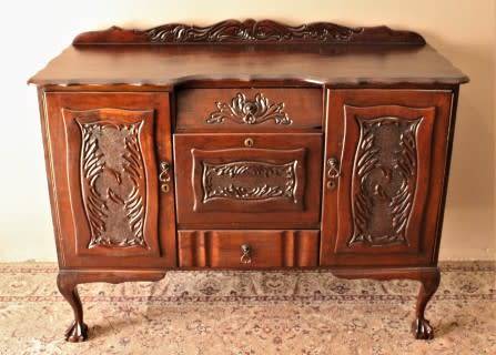 A gorgeous, large vintage Imbuia wood ball & claw buffet/ side server, with carved doors!