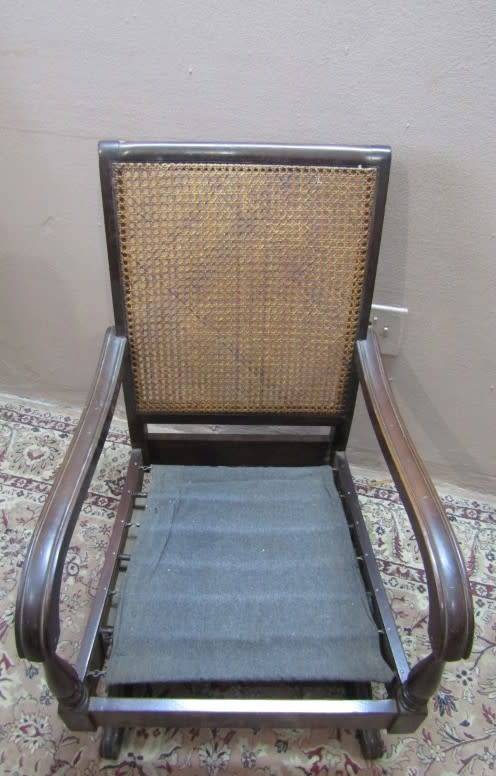 A gorgeous vintage Imbuia rattan backed rocking chair, fantastic in a sun room, patio, porch!!