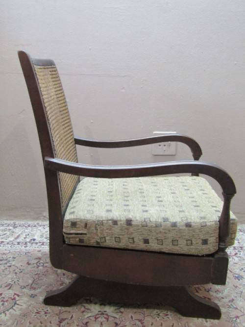 A gorgeous vintage Imbuia rattan backed rocking chair, fantastic in a sun room, patio, porch!!