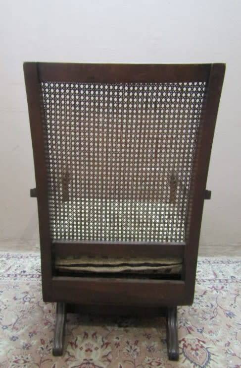 A gorgeous vintage Imbuia rattan backed rocking chair, fantastic in a sun room, patio, porch!!