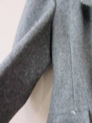 A good quality gent's long XL grey wool winter coat in great condition. Lifespace Sale