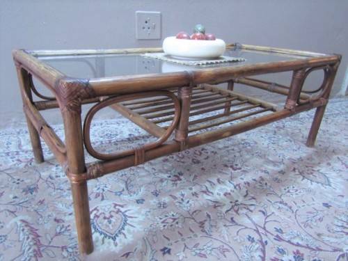 "Cane" coffee table in fantastic condition.Perfect in informal areas-Lifespace Sale